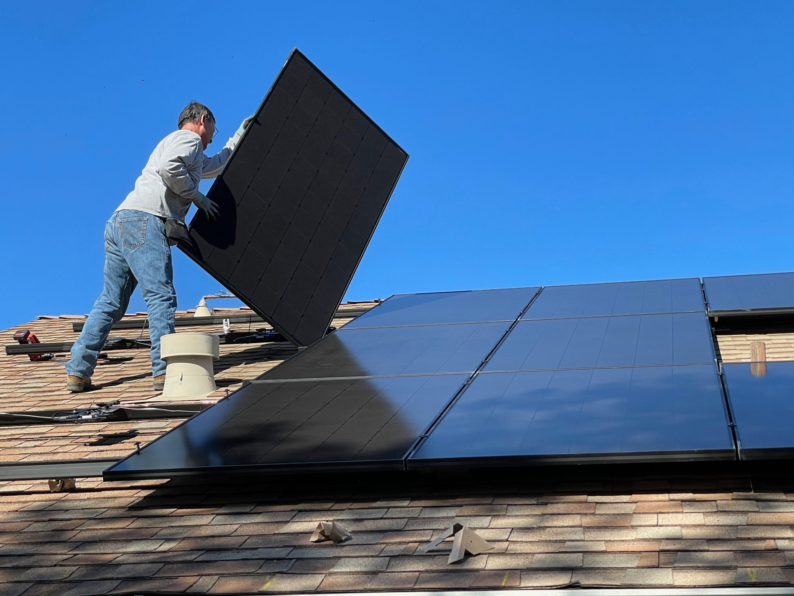 Rooftop solar panels being installed